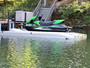 gray  HydroPort Epic with jet ski