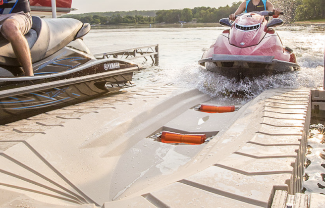 Jet ski driving onto a PWC drive-on dock