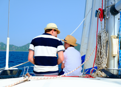 Man and son sitting on their boat