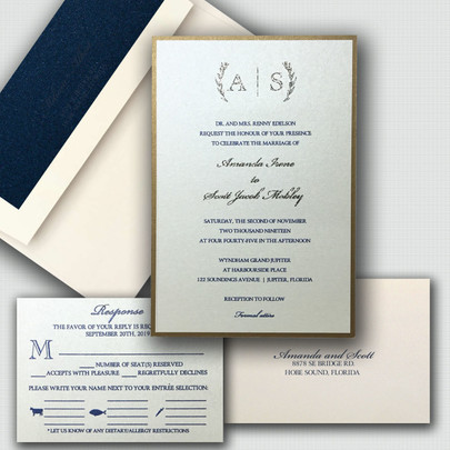 Elegant monogram wedding invitation with a blue and gold