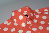 orange polka dot shirt