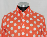 orange polka dot shirt