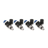 Set of four Injector Dynamics ID1050X fuel injectors, angled view showing blue top seals and connectors