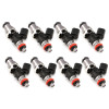 Set of eight Injector Dynamics 1340cc fuel injectors, side view showing grey tops and orange low O-rings.