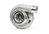 Garrett G35-990 reverse rotation turbo, front angle view showing compressor wheel and outlet pipe