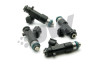 Set of four DeatschWerks 550cc fuel injectors for Genesis Coupe 2.0T, showing black bodies, top fuel inlets, and O-ring seals.