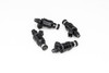 Set of four DeatschWerks 800cc low impedance fuel injectors, top down angle showing electrical connectors and nozzles.