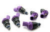 Set of six DeatschWerks 550cc side feed fuel injectors with purple tops, angled view showing nozzles and electrical connectors