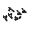 Set of six Deatschwerks Bosch EV14 1250cc fuel injectors, black bodies with electrical connectors, top angled view