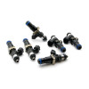 DeatschWerks EV14 220lb/hr fuel injectors, set of six, arranged at various angles showing electrical connectors and fuel rail clips