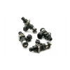 Set of four DeatschWerks 2400cc fuel injectors, top down view showing electrical connectors and nozzle tips.