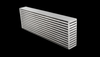 Vibrant horizontal flow intercooler core, angled view showing stacked cooling fins and end tank.