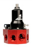 Aeromotive fuel pressure regulator, red hex body with black adjustable dome, AN-08/AN-10 ports and vacuum barb visible.