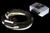 Haltech HPI4 Quad Channel Igniter with braided wiring harness and connector, silver case, 3/4 angle view
