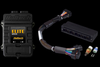Haltech Elite 1500 ECU kit with adaptor harness, connector housing, and small fitting parts shown together