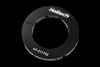 Haltech driveshaft split collar, black ring shown at an angle, HT-011702 marking, magnet holes visible