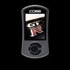 Cobb AccessPORT V3 handheld device, front view, screen shows GT R badge, black case, control dial below