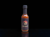 Bottle of High Boost Hot Sauce with dark cap, front label showing flame and B logo, black background