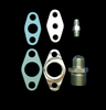 BL T6/Large Frame Turbo Oil Fitting Kit showing gaskets, oil drain flange, and NPT fittings on black background