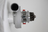 Xona Rotor 65-64 X2C turbo, side view showing compressor wheel, housing and red fittings