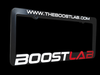 Black BL License Plate Frame, angled view showing WWW.THEBOOSTLAB.COM text and BoostLab logo.