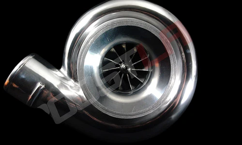 BL372R turbo with race cover, front view showing polished compressor wheel and curved inlet pipe