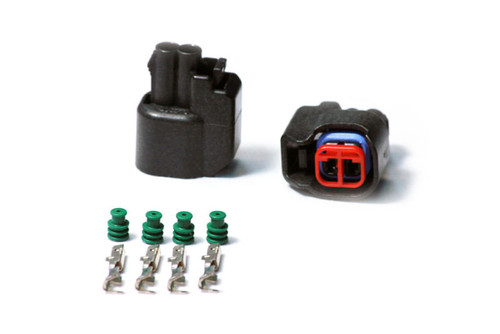 Injector Dynamics USCAR female connector kit with two black housings, four pins, four green seals