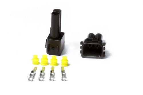 Injector Dynamics OBD2 Honda male connector kit with two 4 pin housings, yellow seals, and terminal pins