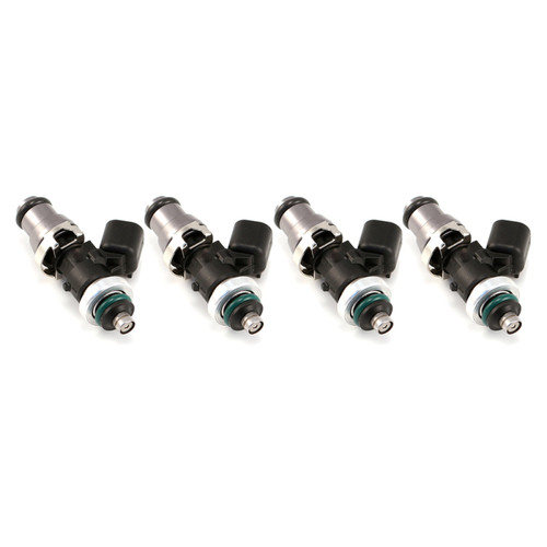Set of four Injector Dynamics 1340cc fuel injectors, side view, grey tops with green o-rings and black connectors.