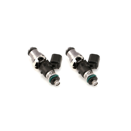 Two Injector Dynamics 1300cc fuel injectors, side view, showing electrical connectors and green lower O-rings.
