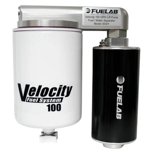 Fuelab Velocity 100 lift pump, front angle showing white filter housing, black pump, and top label.