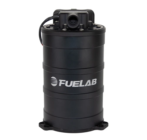 Fuelab 235mm fuel surge tank system, front view showing black cylindrical body, top fittings and mounting base
