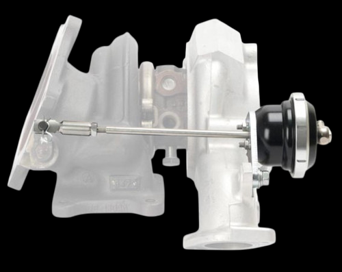 Turbosmart Evo 10 internal wastegate kit mounted on turbo housing, actuator and rod visible, side view