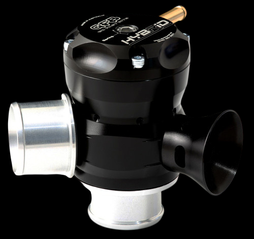 GFB Hybrid TMS dual port blow off valve, black body with silver inlet, outlet, and bottom flanges, side angle view
