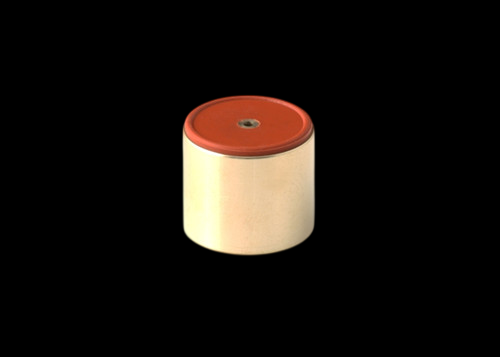 GFB Replacement DV+ Piston, cylindrical body with red top cap, small center hole, angled view