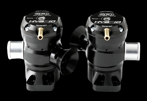GFB Hybrid TMS dual port blow off valves, front view showing two black valves with brass fittings