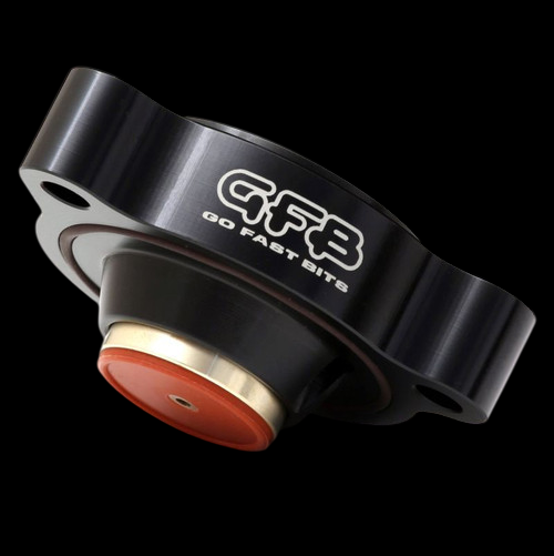 GFB Diverter Valve DV+ shown at an angle, black billet body with red piston and brass sleeve visible.