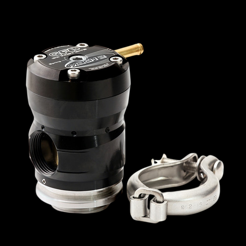 GFB Mach 2 TMS diverter valve, black body with brass nipple, next to a v-band clamp on black background