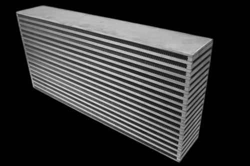 CSF bar and plate intercooler core, angled view showing stacked cooling fins and end tank side