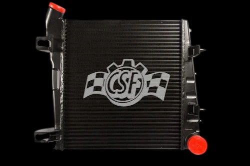 CSF OEM intercooler for 08-10 Ford F-250 6.4L, front view showing red inlet and outlet caps, CSF logo