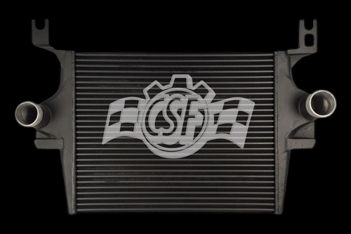 CSF intercooler for 03-05 Ford Excursion 6.0L, front view showing cooling fins, two inlet/outlet pipes, and mounting tabs.