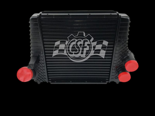 CSF intercooler for 11-12 Ford F-150 3.5L, front view showing black core and three red plugged ports