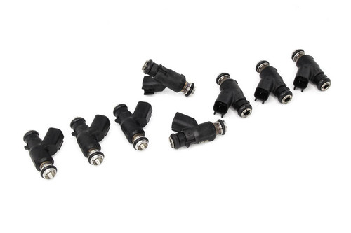 DeatschWerks 60lb fuel injectors, set of 8, arranged in a curved row, showing top connectors and O-rings