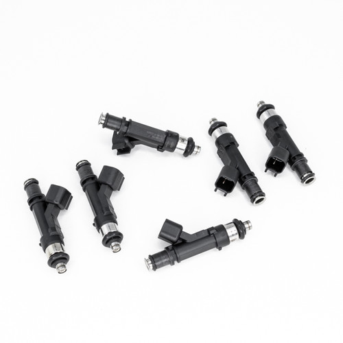 Set of six DeatschWerks 1000cc fuel injectors for Lexus IS300 2JZ-GE, top angled view showing connectors and O-rings