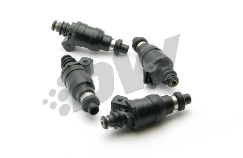 Set of four DeatschWerks 800cc top feed fuel injectors for 240sx CA18DET, angled view showing o-rings and connectors