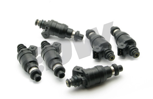 DeatschWerks 800cc top feed fuel injectors, set of five, black bodies, angled view showing connectors and fuel inlets
