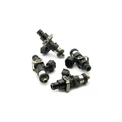Set of four DeatschWerks 2200cc fuel injectors for Subaru WRX/STI, showing electrical connectors and fuel rail o-rings.