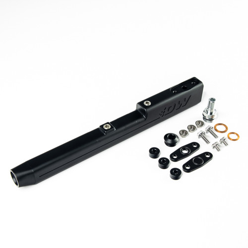DeatschWerks Honda B-Series fuel rail shown at an angle with mounting hardware, fitting, and grommets laid out beside it