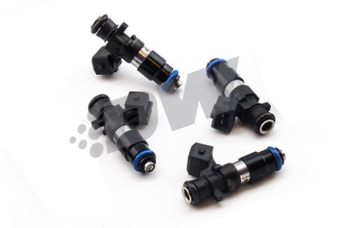 Set of 4 DeatschWerks EV14 1200cc fuel injectors, black bodies with blue O-rings, angled view showing electrical connectors and fuel rail clips