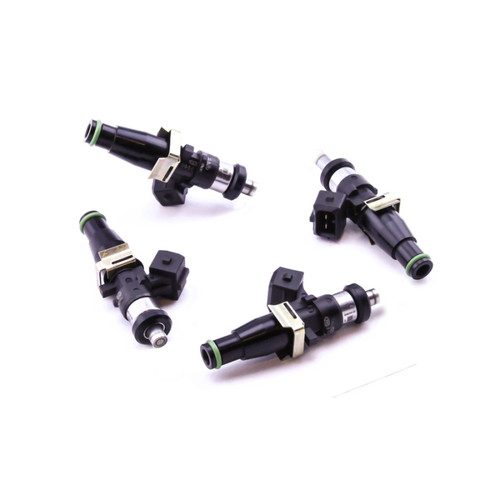 Set of four DeatschWerks EV14 1500cc fuel injectors, angled view showing green O-rings and electrical connectors.